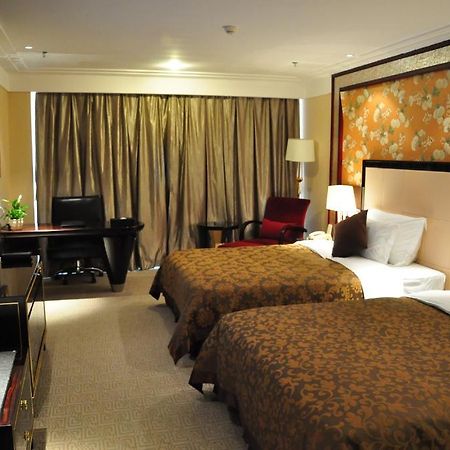 New Cozy Harbour Hotel Nanning Room photo