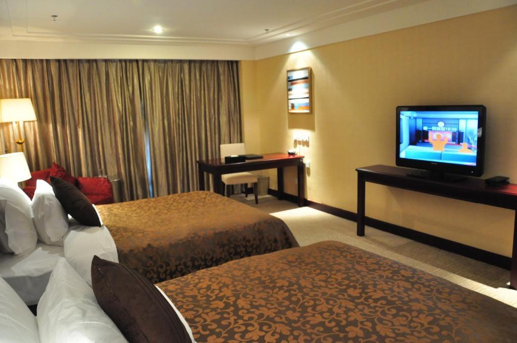 New Cozy Harbour Hotel Nanning Room photo